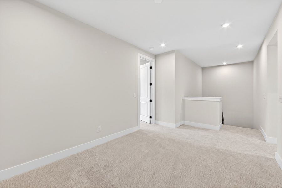 Spacious, unfurnished interior of a new home in Seven Oaks, Belmont (Image 32).