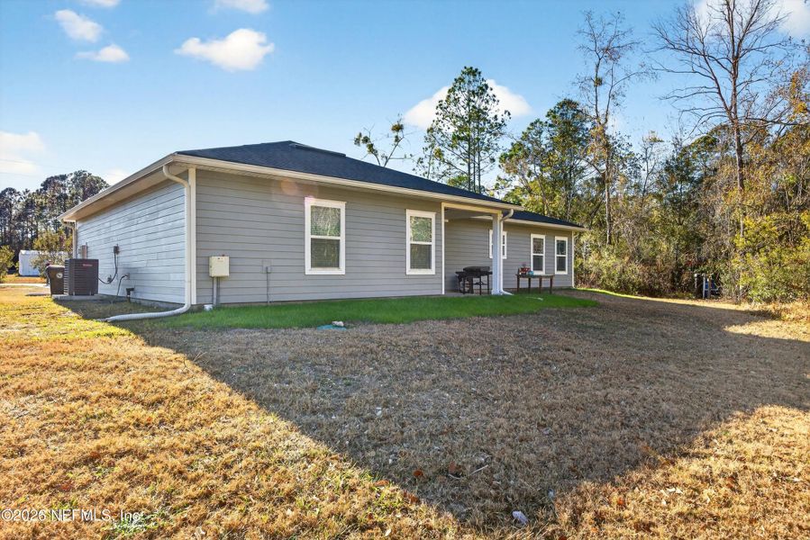 Exterior details and patio area of a home in , Middleburg (Image 24).