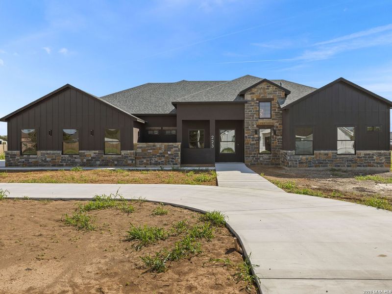 Front exterior of a new home in , Seguin, TX, highlighting curb appeal (Image 33). Front exterior of a new home in , Seguin, TX, highlighting curb appeal (Image 33).