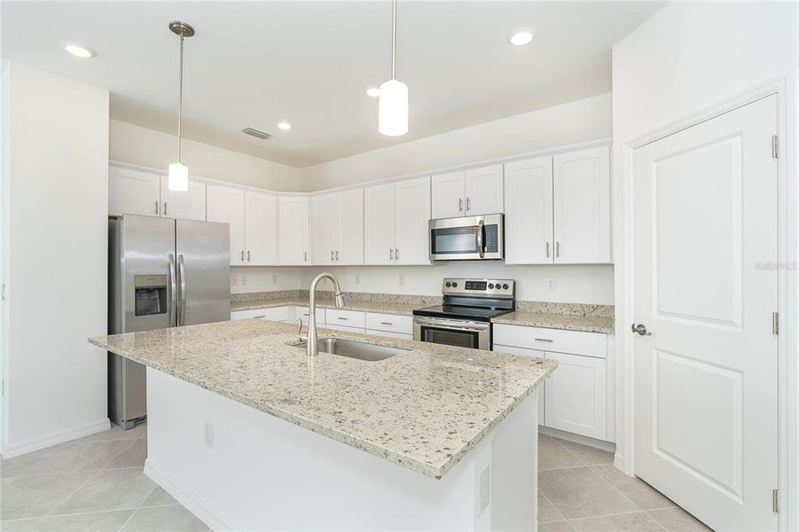 Furnished interior view inside a new home in , Port Charlotte (Image 9).