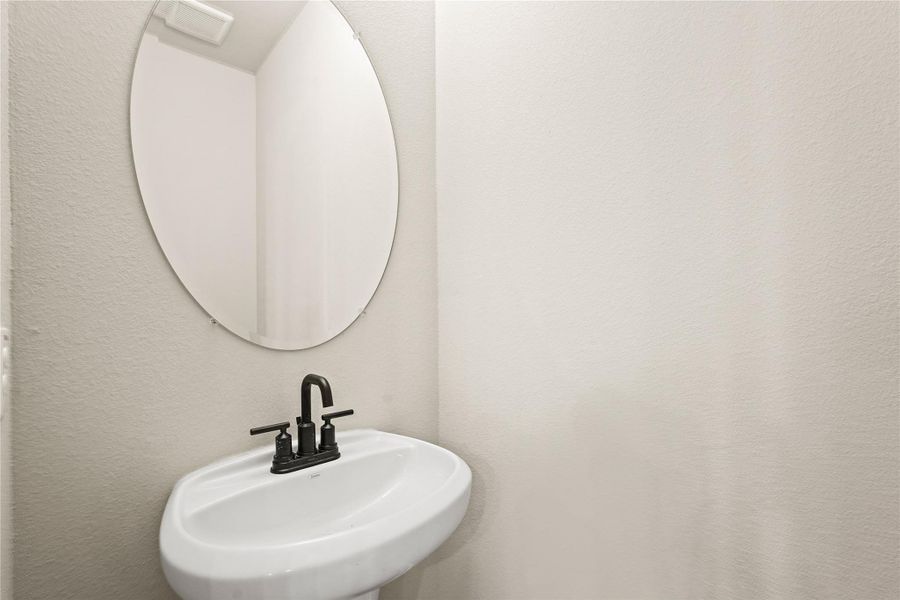Half bath (*Photo not of actual home and used for illustration purposes only.)