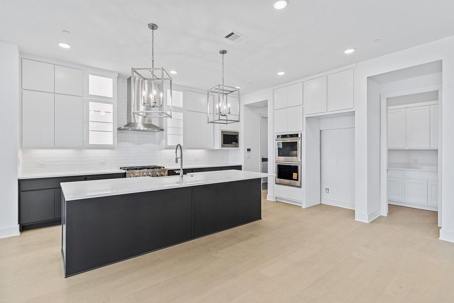 Furnished interior view inside a new home in Hilltop Ranch, Leander (Image 9).