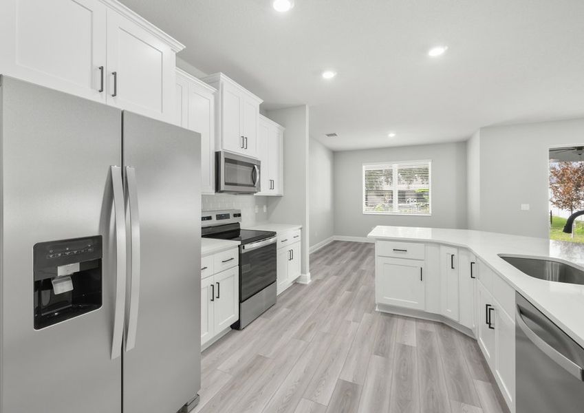 This kitchen comes with stylish backsplash and stainless steel appliances
