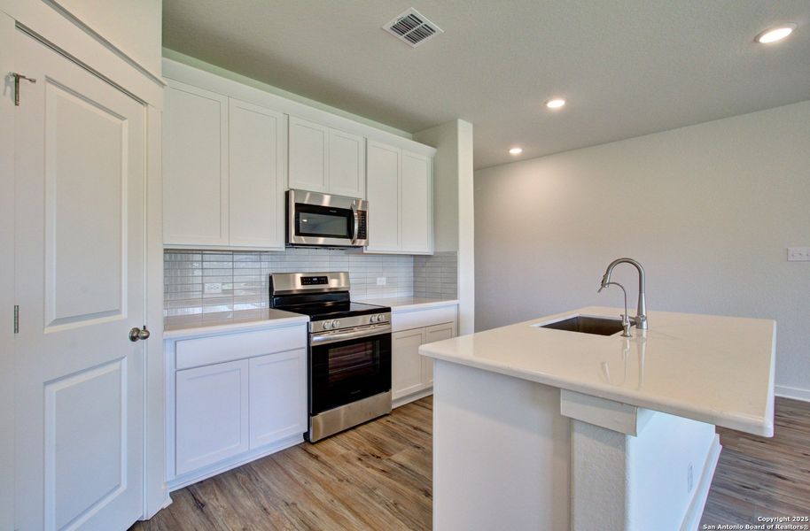 Furnished interior view inside a new home in Westridge - Premier, San Antonio (Image 3). Furnished interior view inside a new home in Westridge - Premier, San Antonio (Image 3).