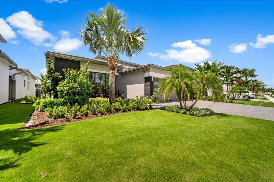 Front exterior of a new home in , Boca Raton, FL, highlighting curb appeal (Image 1). Front exterior of a new home in , Boca Raton, FL, highlighting curb appeal (Image 1).