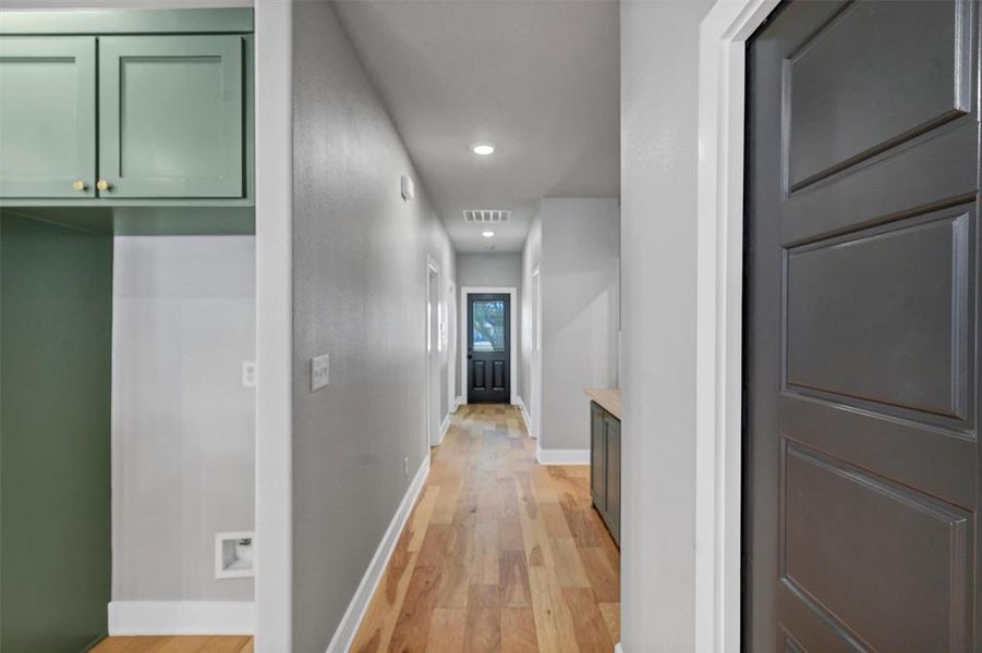 Hall featuring recessed lighting and light wood-style floors