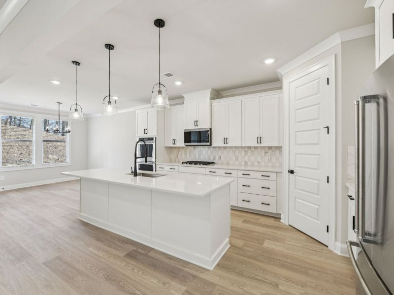 Furnished interior view inside a new home in Vines at Mill Creek - Legacy Series, Braselton (Image 7). Furnished interior view inside a new home in Vines at Mill Creek - Legacy Series, Braselton (Image 7).