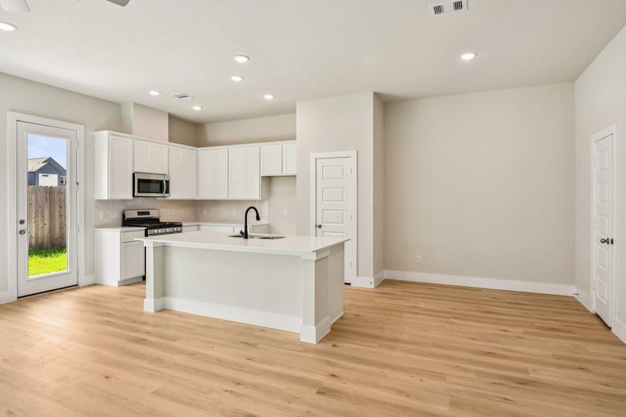 Furnished interior view inside a new home in Alicante, Houston (Image 6).