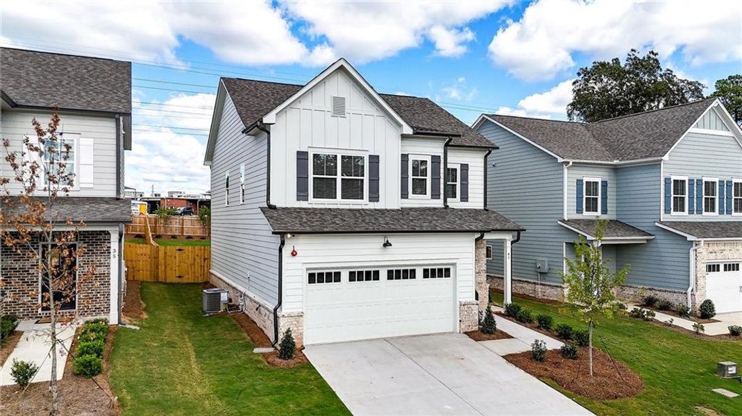 Front exterior of a new home in , Marietta, GA, highlighting curb appeal (Image 19).