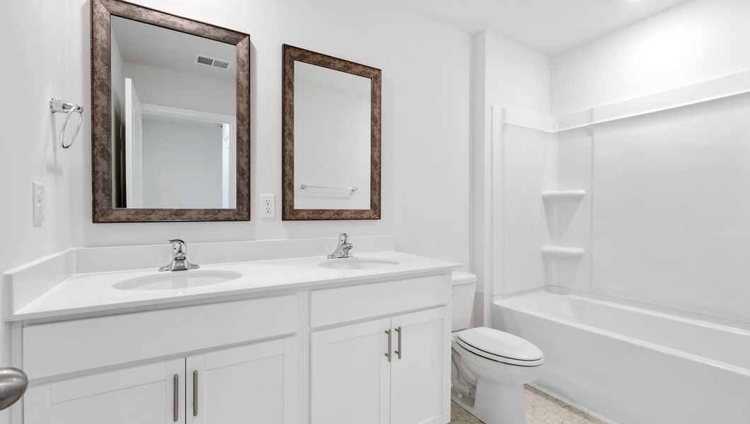 Representative furnished interior of a home built from the BELHAVEN by D.R. Horton in Waverly Station, Greenwood (Image 11).