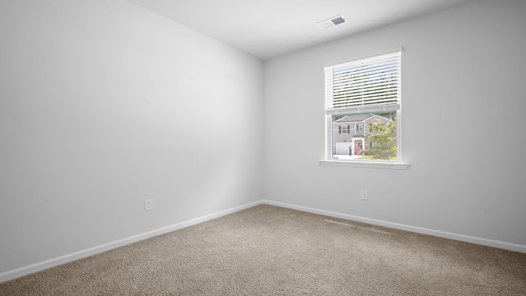 Spacious, unfurnished interior of a new home in The Lakes at North Glynn, Brunswick (Image 20).