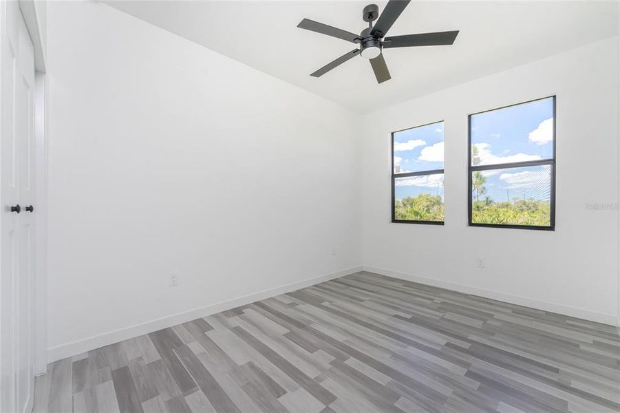 Spacious, unfurnished interior of a new home in , Port Charlotte (Image 47).