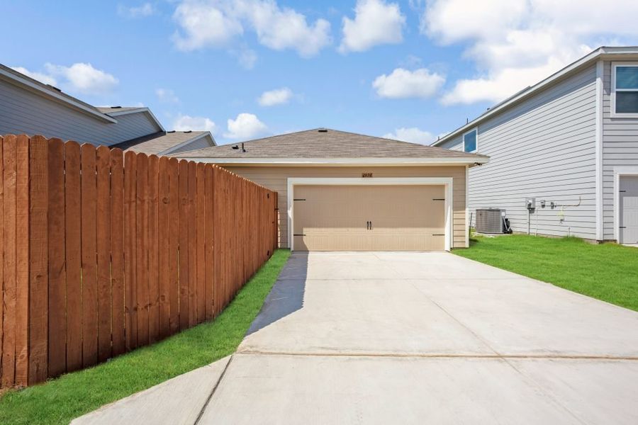 Representative exterior photo of a completed home built from the Bastrop by Impression Homes in Heartland, Heartland, TX (Image 26).