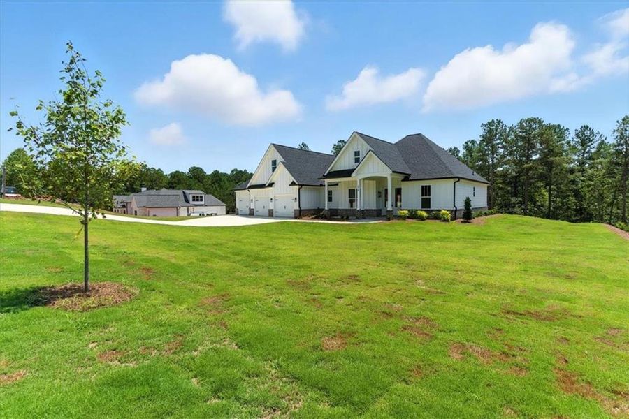 Front exterior of a new home in , Waleska, GA, highlighting curb appeal (Image 26).
