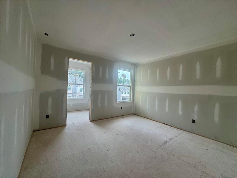 In-progress construction of a new home in Eastlyn Crossing, Flowery Branch, GA (Image 14).