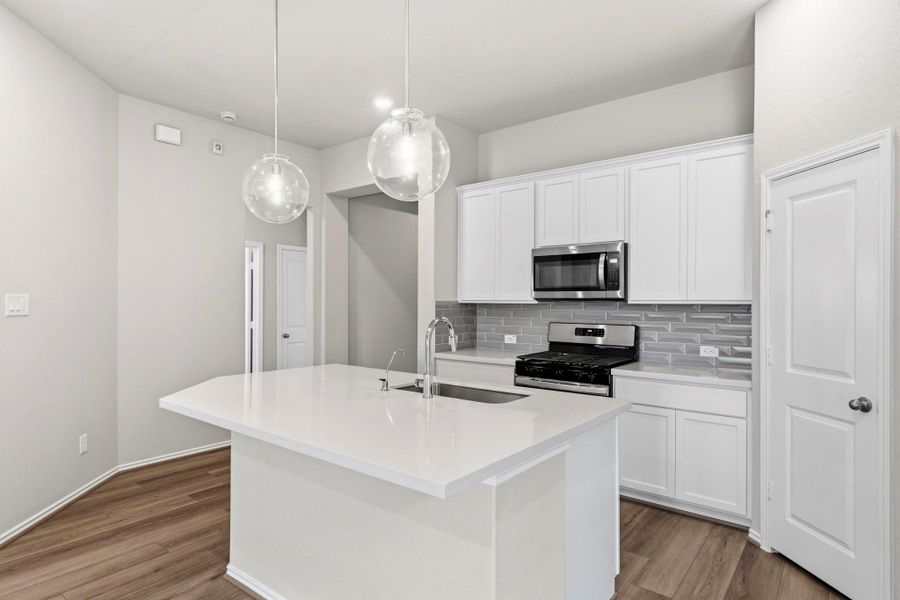 Furnished interior view inside a new home in Bridgeland, Cypress (Image 14).