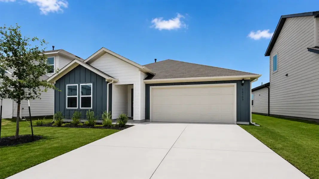 Representative exterior photo of a completed home built from the Meadowlark by Taylor Morrison in Longview, Del Valle, TX (Image 5).