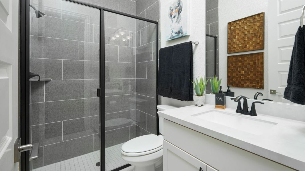 Representative furnished interior of a home built from the Mahogany by Brightland Homes in Sunterra, Katy (Image 11).