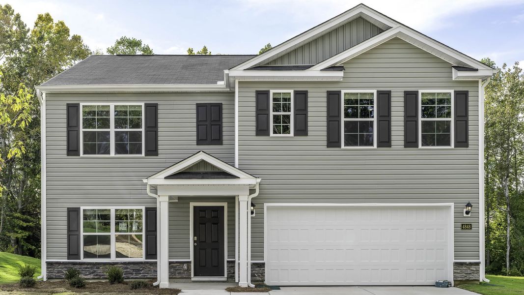 Front exterior of a new home in Mount Hope Estates, Winston-Salem, NC, highlighting curb appeal (Image 1). Front exterior of a new home in Mount Hope Estates, Winston-Salem, NC, highlighting curb appeal (Image 1).