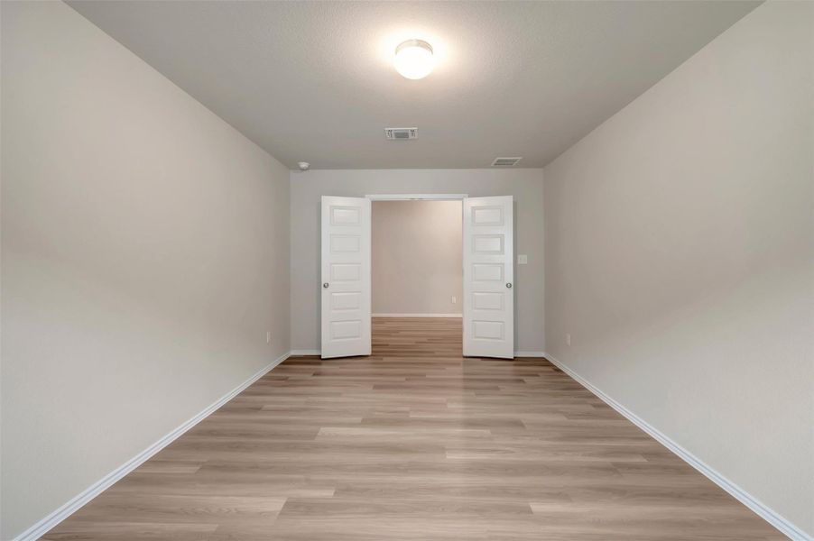 Spacious, unfurnished interior of a new home in Carillon, Manor (Image 28).
