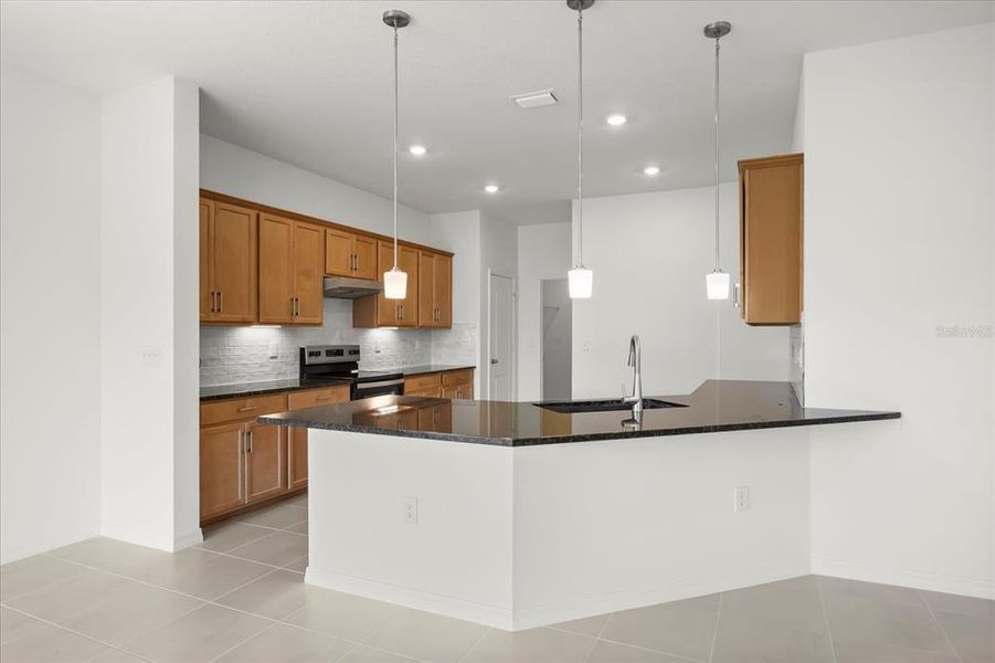 Furnished interior view inside a new home in Hickory Ranch, Auburndale (Image 7).