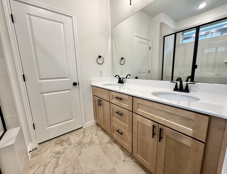 Furnished interior view inside a new home in Sage Hollow, Kyle (Image 17).