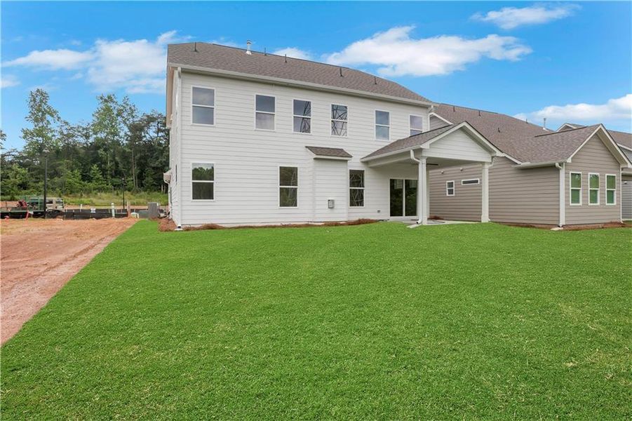 Exterior details and patio area of a home in Marble Tree, Ball Ground (Image 27).