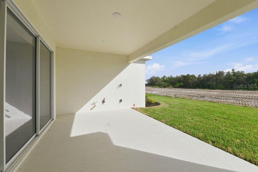 Exterior details and patio area of a home in Firethorn, Parrish (Image 3).
