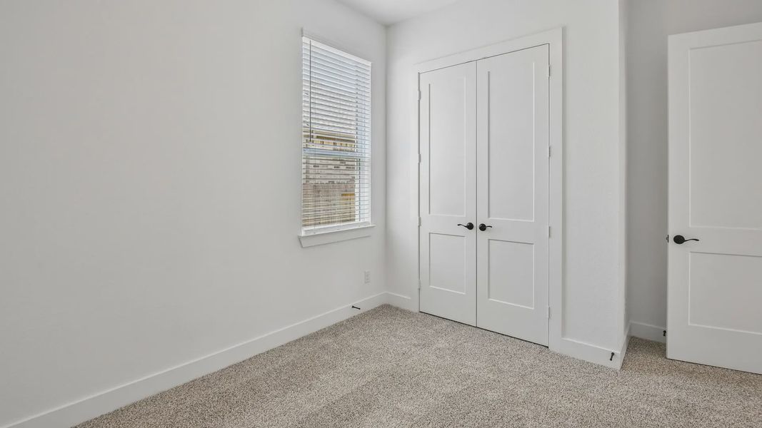 Spacious, unfurnished interior of a new home in Artavia, Conroe (Image 44).