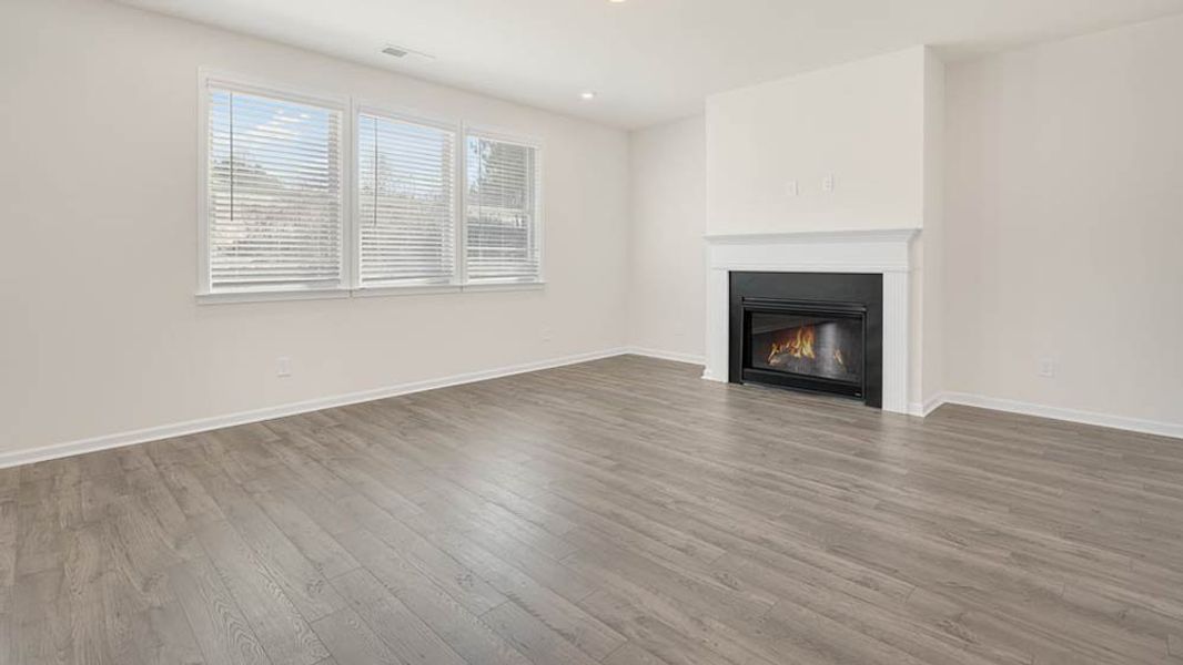 Representative unfurnished interior of a home built from the Ingram by Taylor Morrison in Falls Creek, Flowery Branch (Image 20).