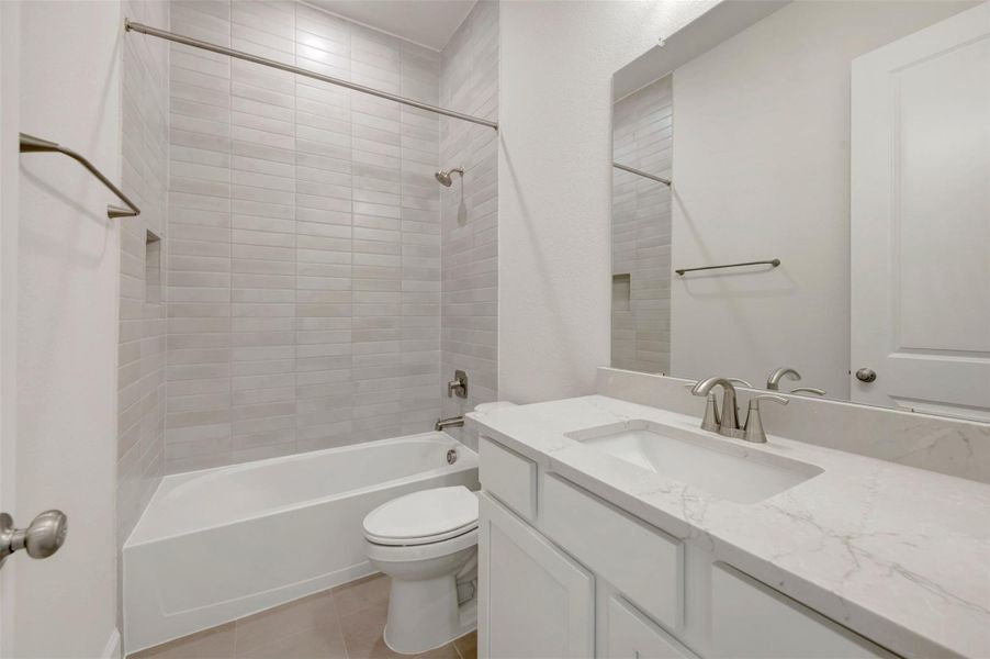 Furnished interior view inside a new home in Sienna - Grove Collection, Missouri City (Image 9).