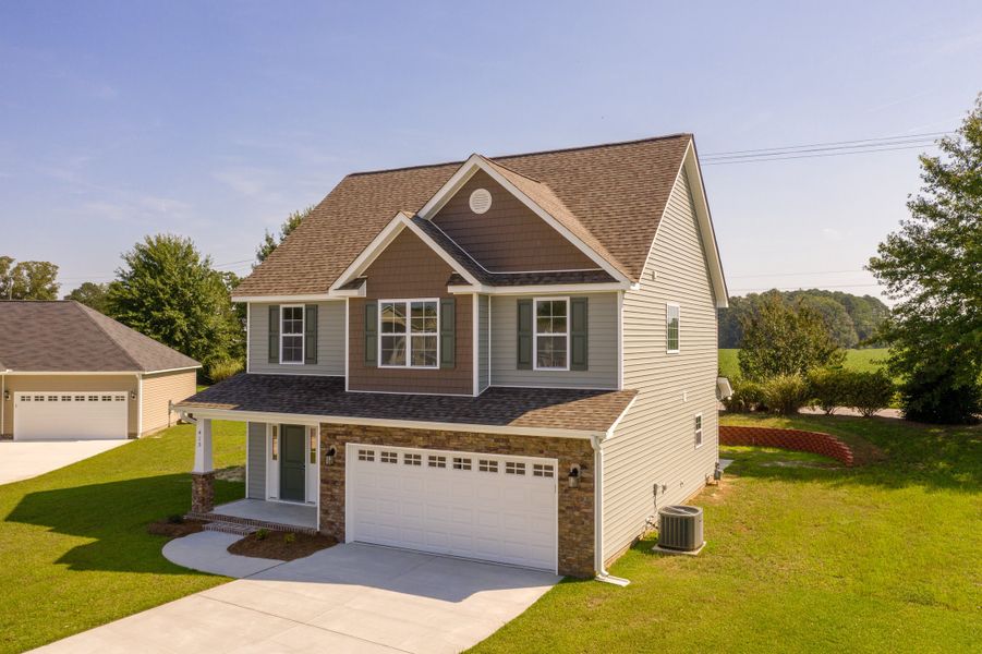 Representative exterior photo of a completed home built from the Rockbridge by Bill Clark Homes in Davenport Farms, Winterville, NC (Image 33).