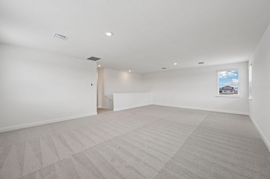 Spacious, unfurnished interior of a new home in Brystol at Wylder - Reserve Series, Port St. Lucie (Image 12).