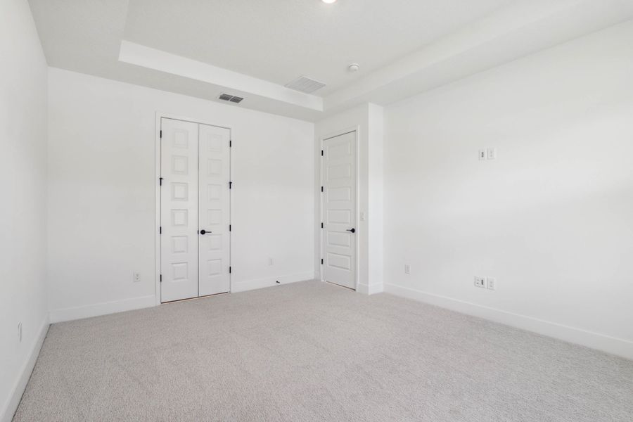 Representative unfurnished interior of a home built from the Hemingway by Rockwell Homes in Northlake At Ovation, Winter Garden (Image 18).