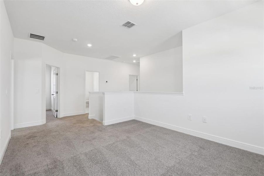 Spacious, unfurnished interior of a new home in Cyrene at Minneola - Villas, Montverde (Image 18).