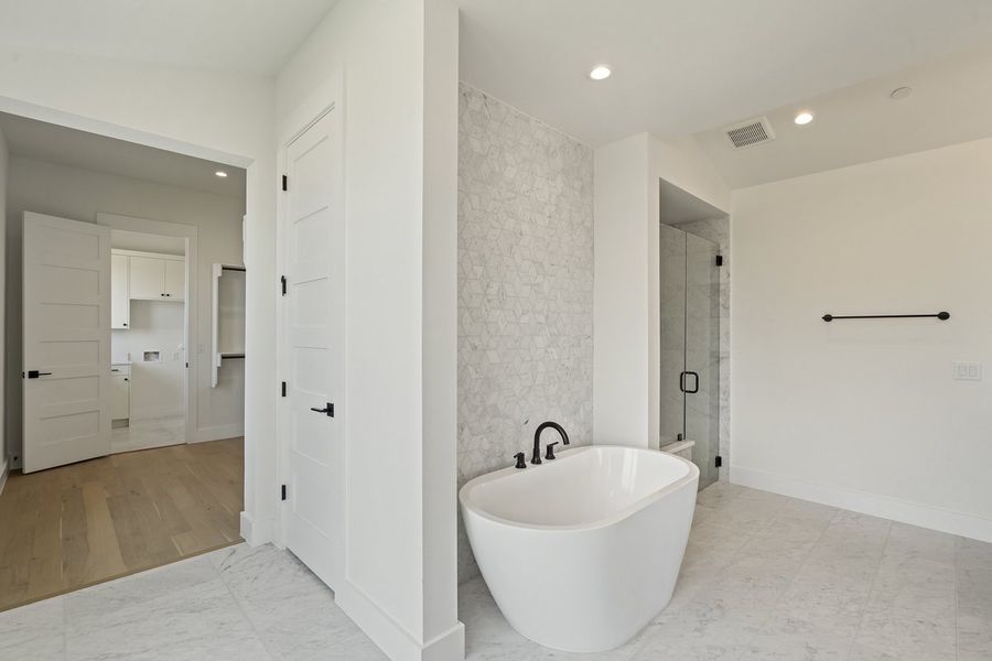 Furnished interior view inside a new home in Milky Way at River Place, Austin (Image 15). Furnished interior view inside a new home in Milky Way at River Place, Austin (Image 15).