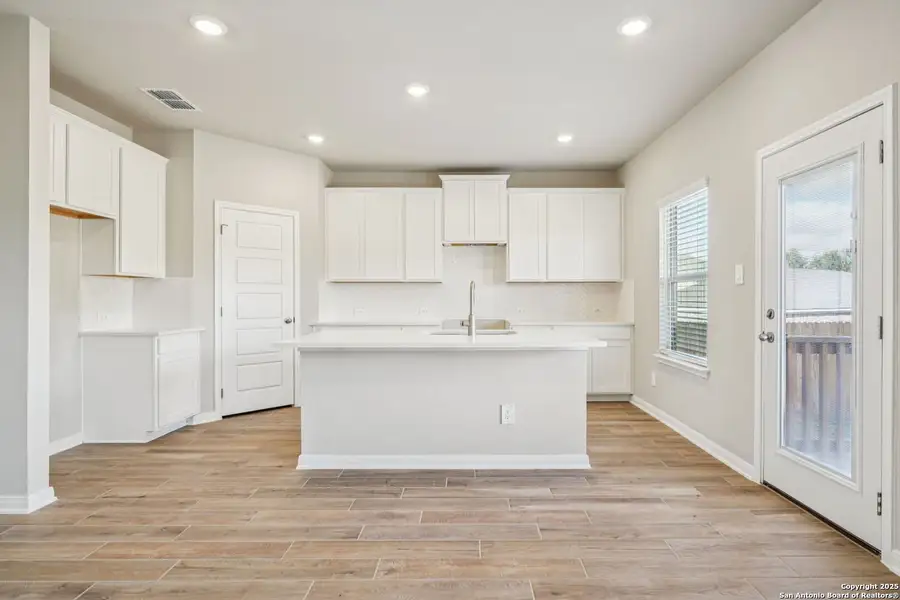 Furnished interior view inside a new home in Royal Crest, San Antonio (Image 6).