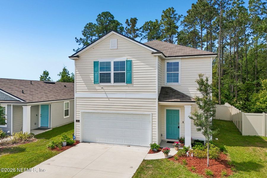 Front exterior of a new home in , St. Augustine, FL, highlighting curb appeal (Image 24).