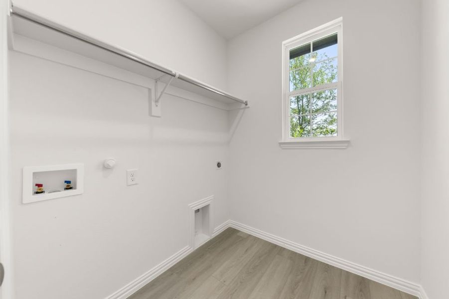Representative unfurnished interior of a home built from the Cypress by UnionMain Homes in Edgewater, Fate (Image 20).