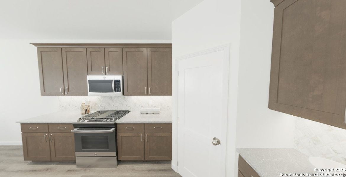 Furnished interior view inside a new home in The Summit at Saddlebrook Ranch 55's, Schertz (Image 5).