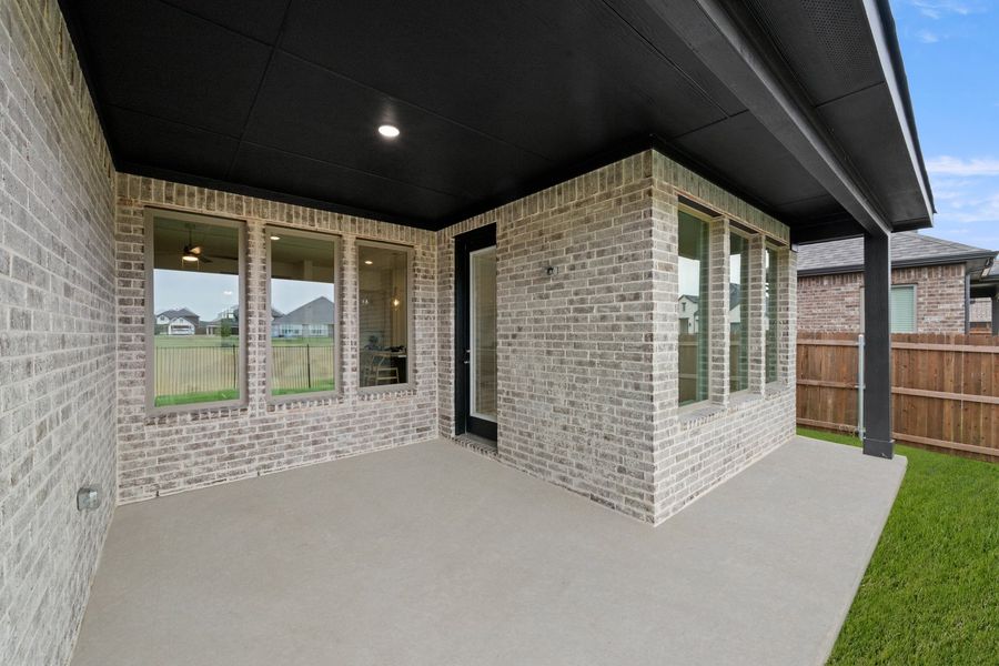 Exterior details and patio area of a home in Panchasarp Farms, Burleson (Image 22).