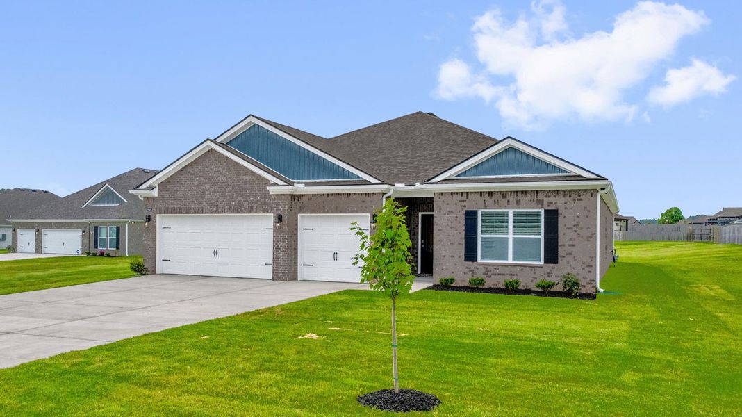 Front exterior of a new home in Riverwood Gardens, Oakland, TN, highlighting curb appeal (Image 2).