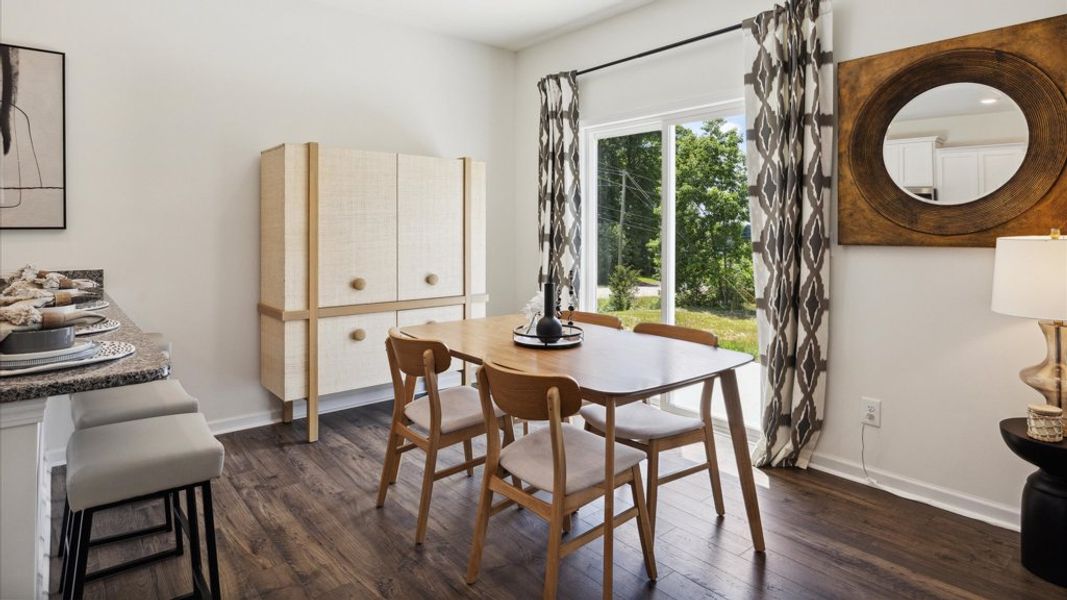 Representative furnished interior of a home built from the Altamont Townhome by D.R. Horton in Saint Marc's, Powell (Image 10).