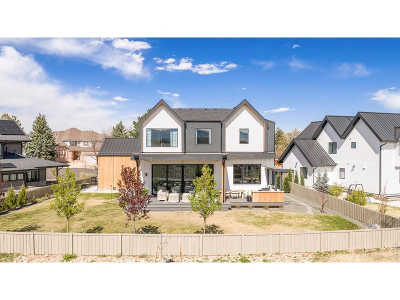 Front exterior of a new home in , Louisville, CO, highlighting curb appeal (Image 26).