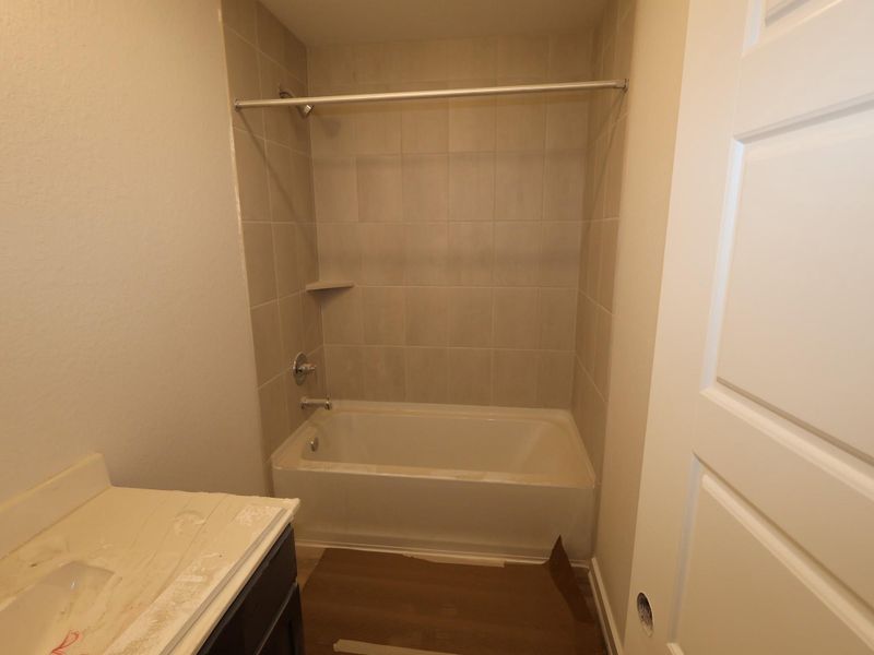 Furnished interior view inside a new home in Pinewood at Grand Texas, New Caney (Image 4).