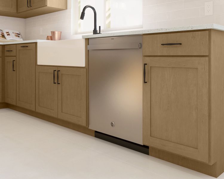 White apron-front sink and stainless steel appliances