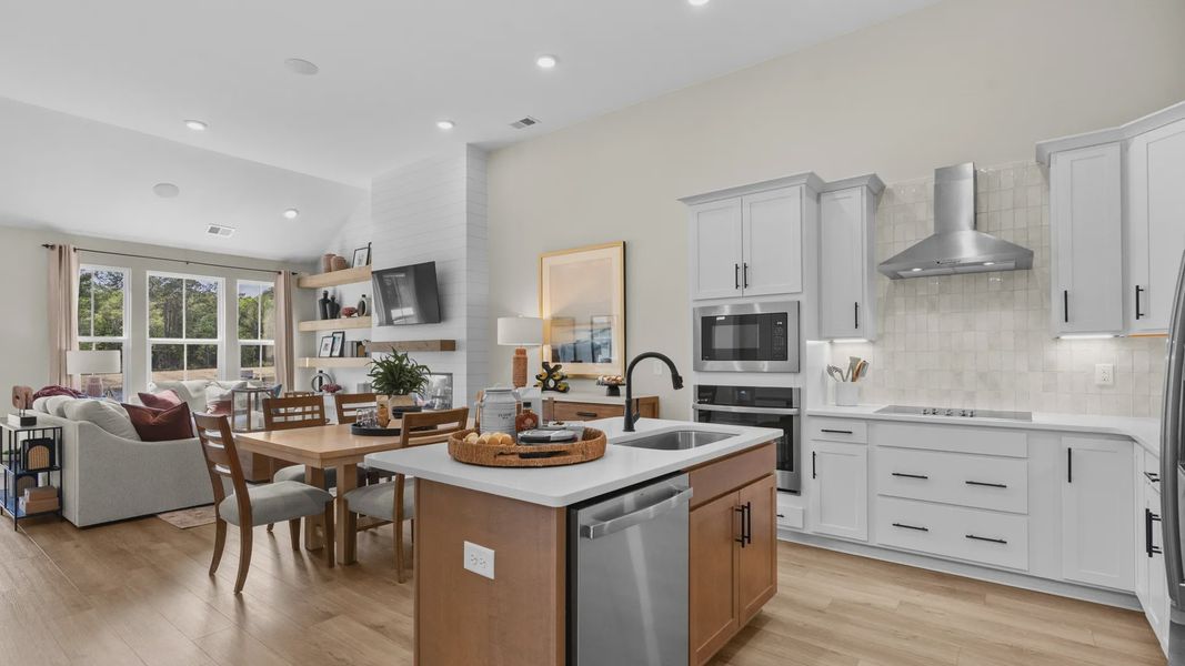 The Summit kitchen offers a large island and open flow for daily living.