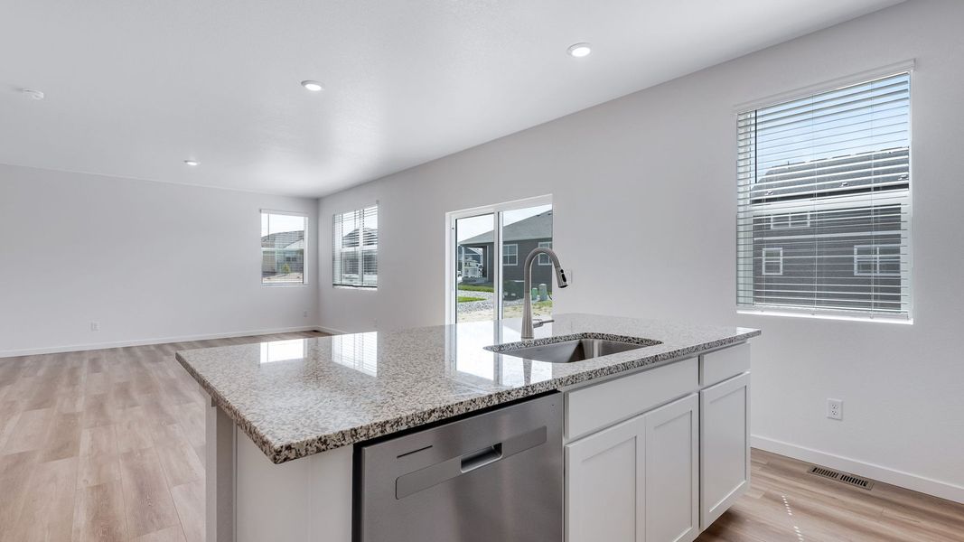 Furnished interior view inside a new home in Trails at Crowfoot, Parker (Image 8).