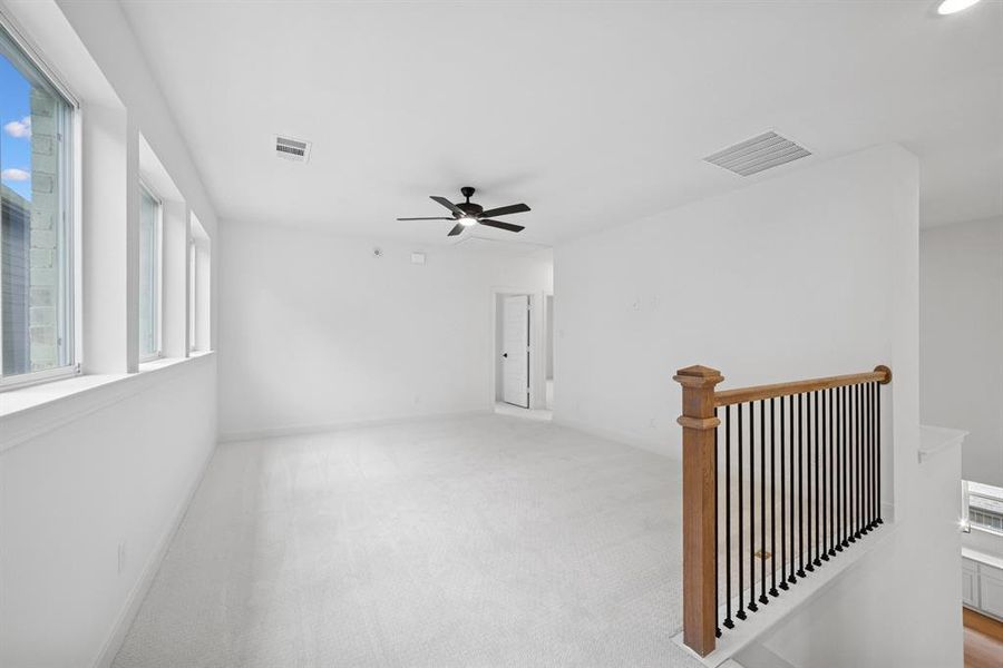 Spacious, unfurnished interior of a new home in Pecan Square - Gardens, Northlake (Image 16). Spacious, unfurnished interior of a new home in Pecan Square - Gardens, Northlake (Image 16).
