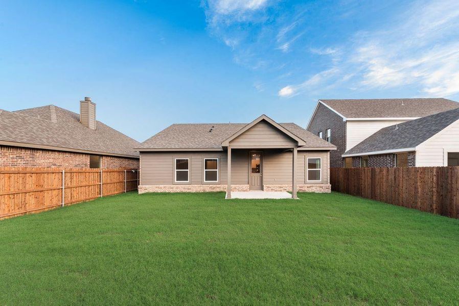 Front exterior of a new home in Liberty Pointe, Gainesville, TX, highlighting curb appeal (Image 17).